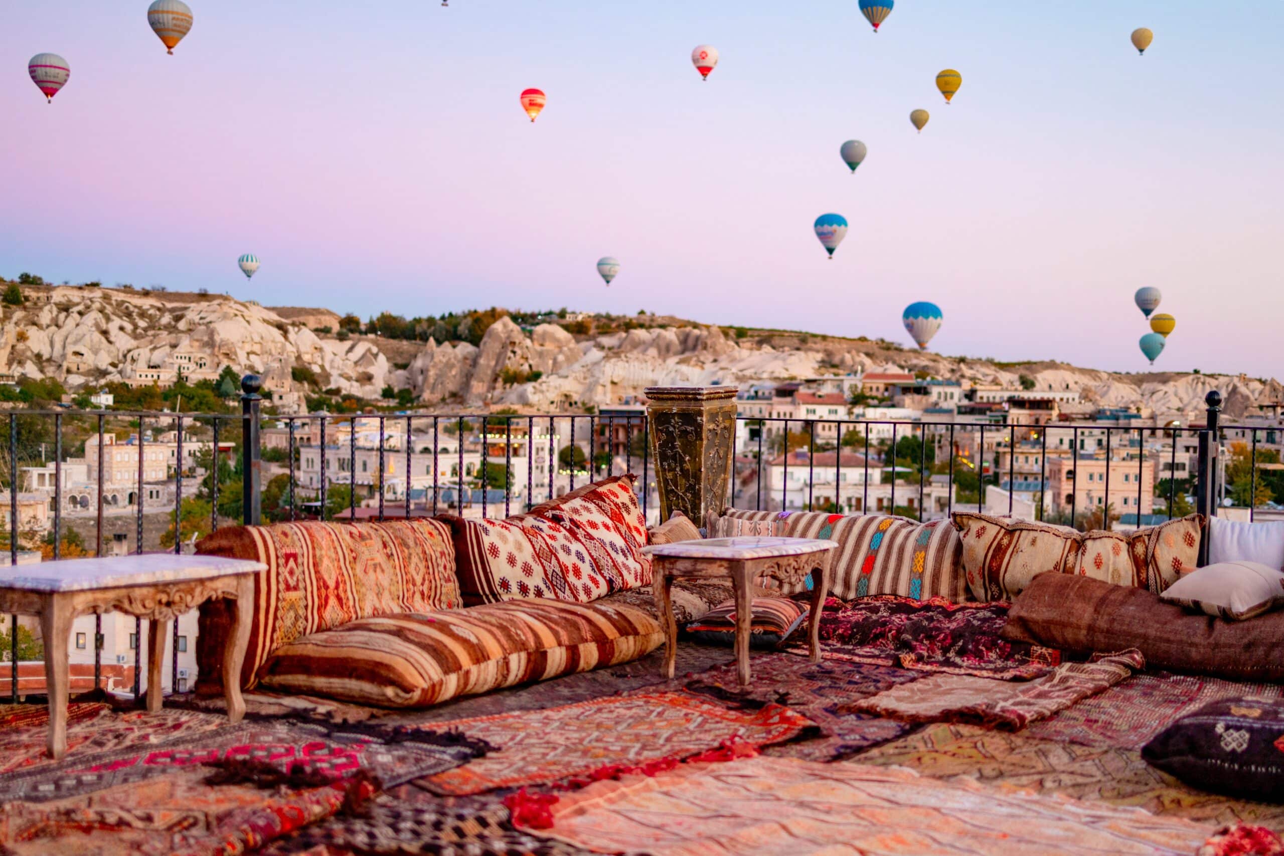 Cappadocia terrace balloons flying